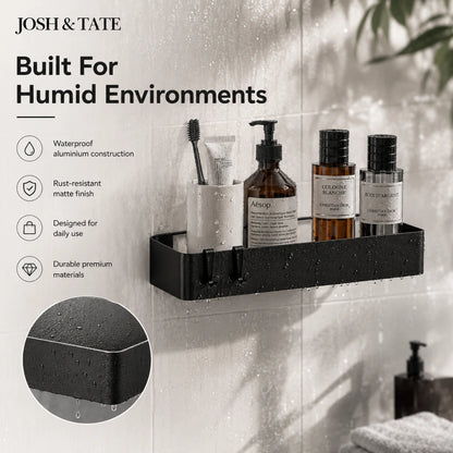 Josh & Tate - LineShelf™ Matte Black Adhesive Shelf Set - Black bathroom shelf with toiletries against a tiled wall, featuring Josh & Tate branding.