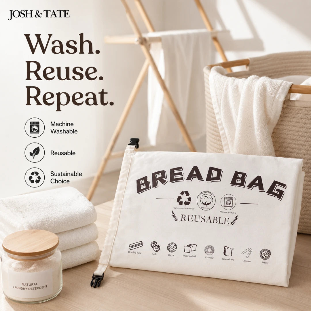 Josh & Tate - LoafSack™ Cotton Bread Bag - Reusable bread bag with 'Josh & Tate' branding and sustainability message on a wooden surface.