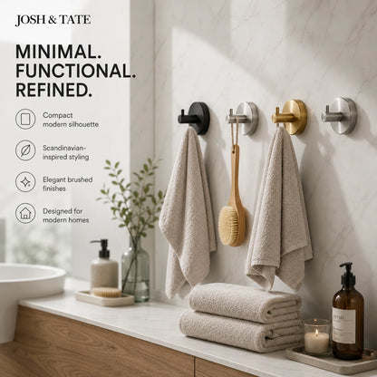 Josh & Tate - LockDisc™ Twist-Lock Wall Hook Set - Bathroom setting with towels and decor elements, featuring Josh & Tate branding.