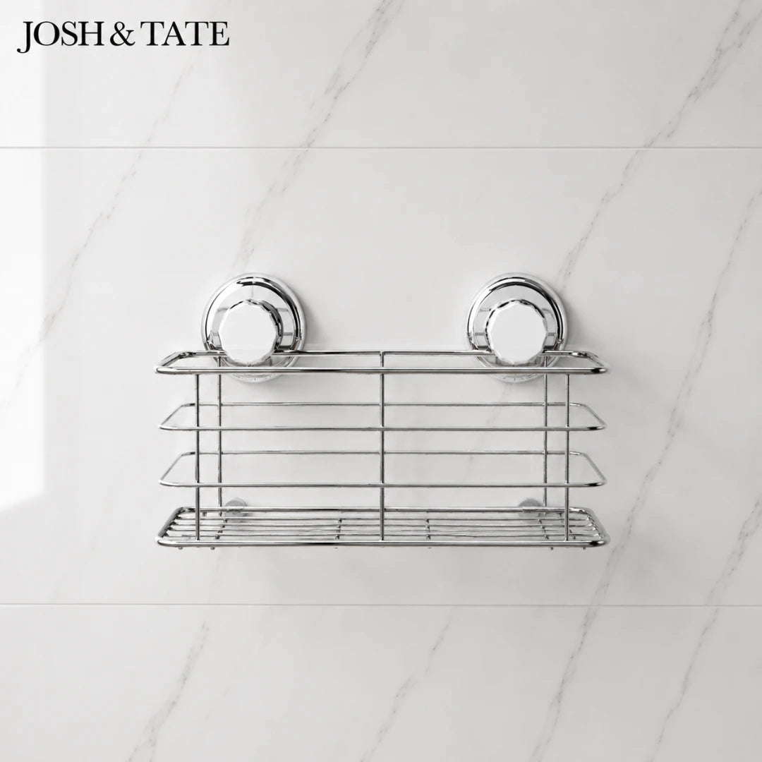 Josh & Tate -LockRack™ Mini Twist-Lock Wire Shower Basket - Metal wall-mounted shower caddy with two shelves on a tiled bathroom wall, branded 'Josh & Tate'.