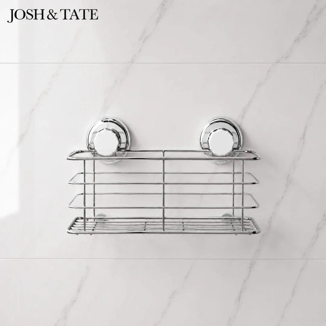 Josh & Tate -LockRack™ Mini Twist-Lock Wire Shower Basket - Metal wall-mounted shower caddy with two shelves on a tiled bathroom wall, branded 'Josh & Tate'.