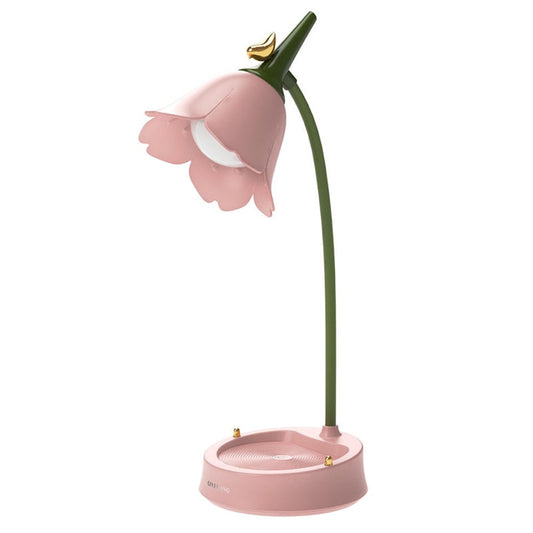 Pink flower-shaped lamp on a white background