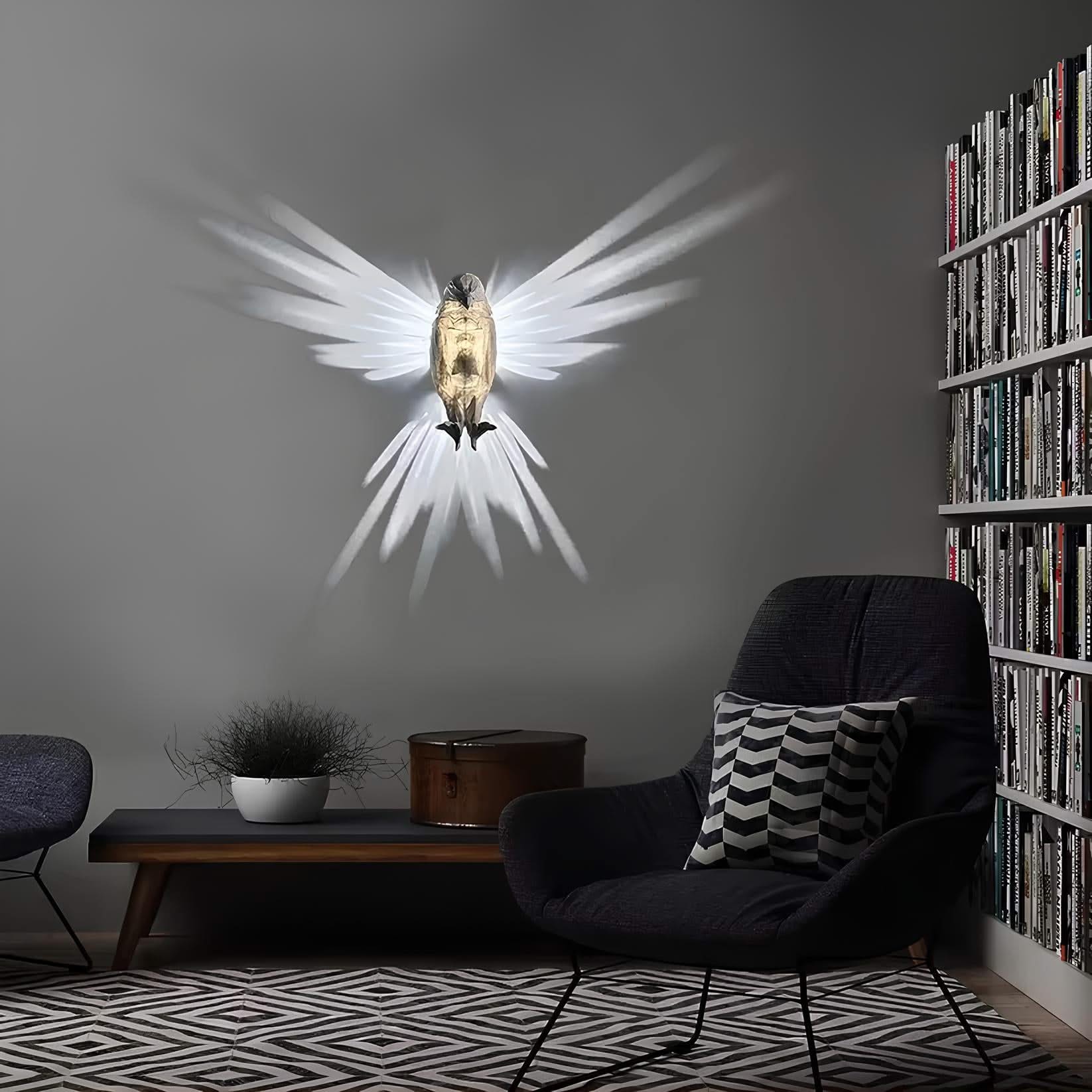 Modern living room with a wall-mounted angel sculpture, dark armchair, and bookshelf.
