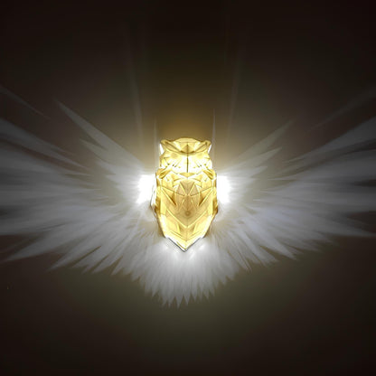 Gold angelic figure with wings on a dark background