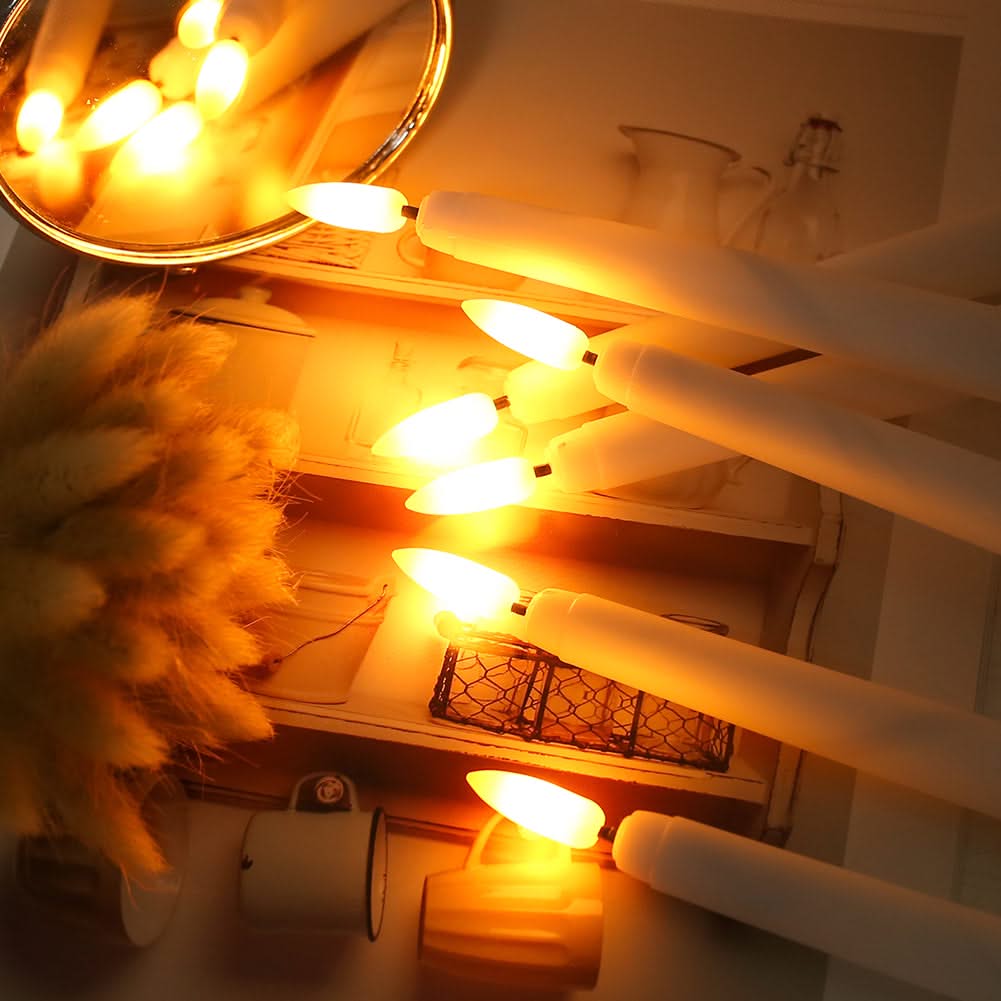 String lights draped over a surface with a warm glow