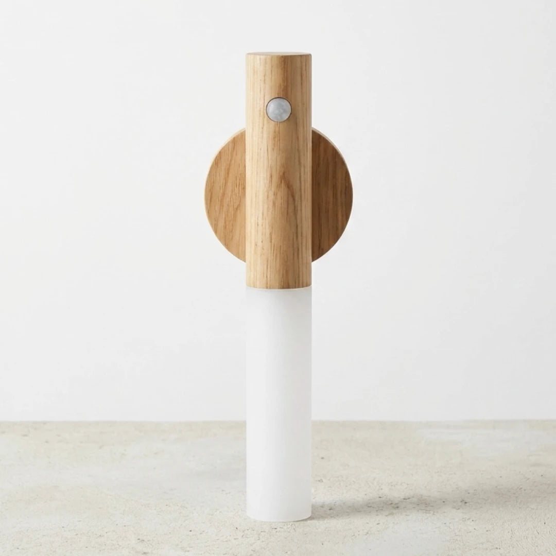 Josh & Tate - LumiDock™ Motion Wall Light - Wooden and white salt and pepper shaker on a light wooden surface with a white background