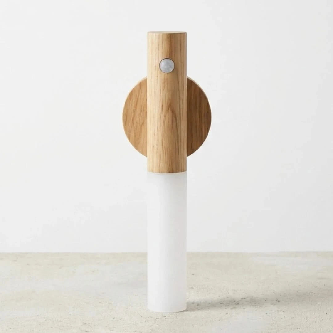 Josh & Tate - LumiDock™ Motion Wall Light - Wooden and white salt and pepper shaker on a light wooden surface with a white background