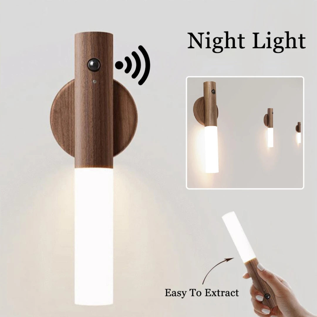 Josh & Tate - LumiDock™ Motion Wall Light - Wooden wall-mounted night light with a hand holding a remote control on a light gray background
