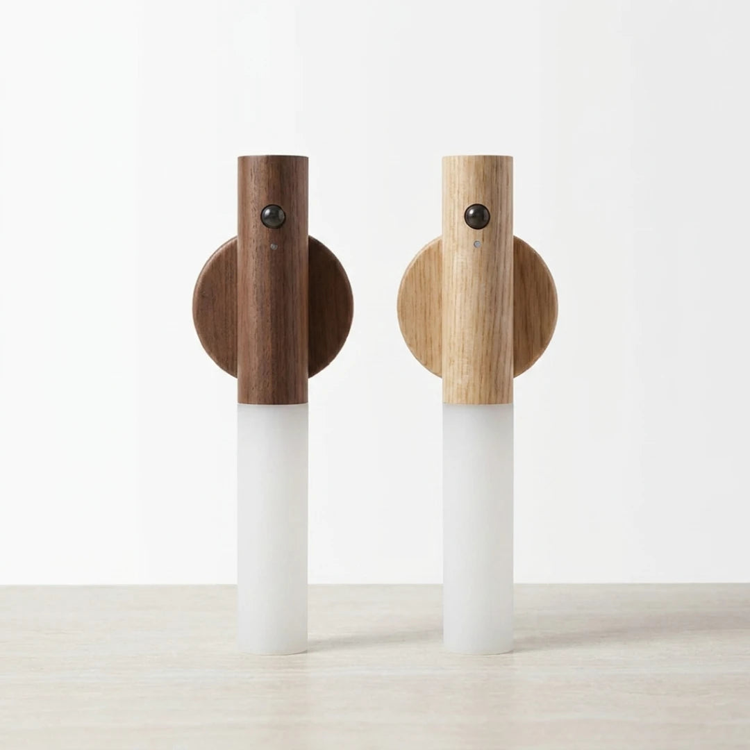 Josh & Tate - LumiDock™ Motion Wall Light - Two wall-mounted lamps with wooden and white design on a light background