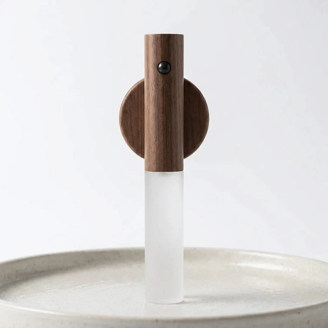Josh & Tate - LumiDock™ Motion Wall Light - Wooden faucet with white spout on a light gray background
