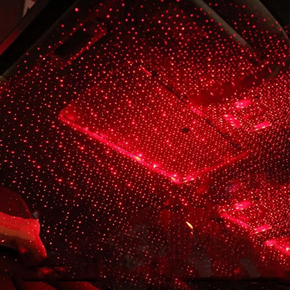 Car interior with red LED lights on the ceiling