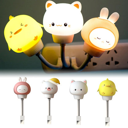 Set of cartoon animal-shaped night lights with a focus on a white cat design.