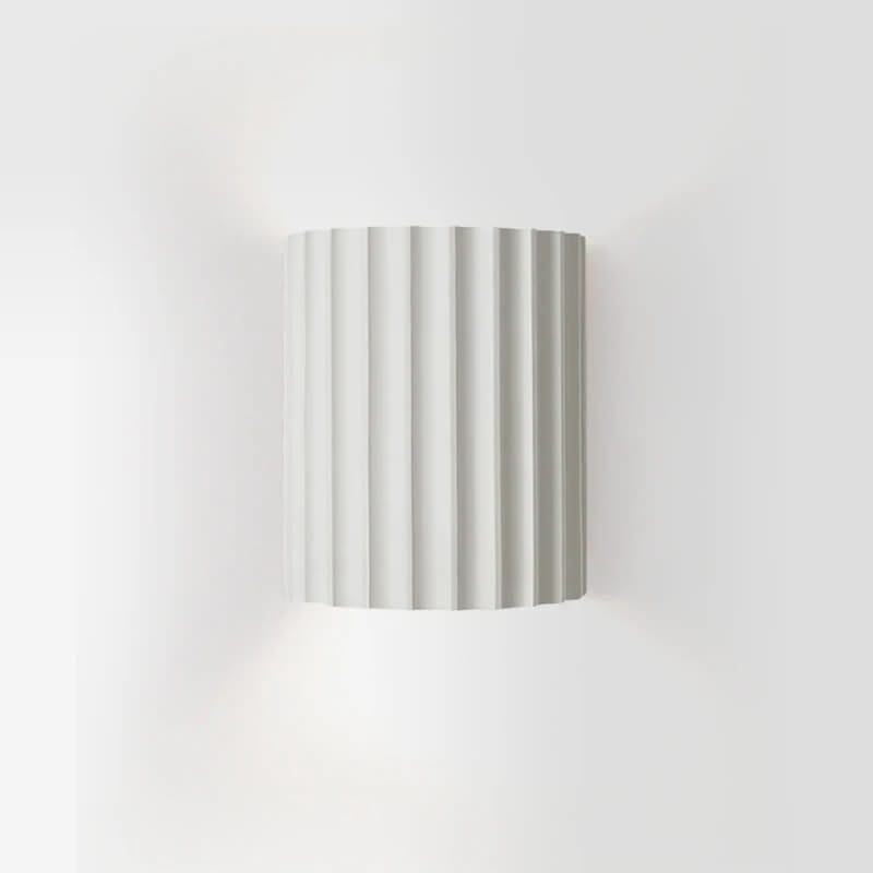 Striped cylindrical lampshade on a white background