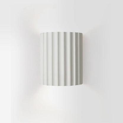 Striped cylindrical lampshade on a white background