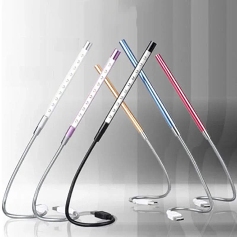 Set of colorful LED light sticks on a reflective surface with a gradient background