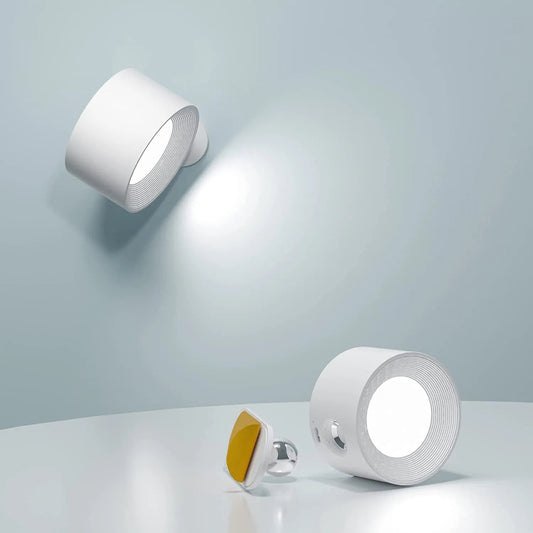 Two white wall lights on a light gray background