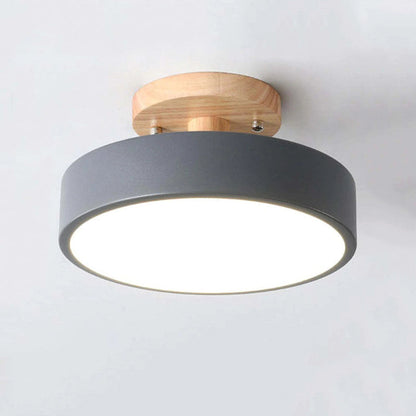 Ceiling light fixture with gray shade and wooden finish on a white background