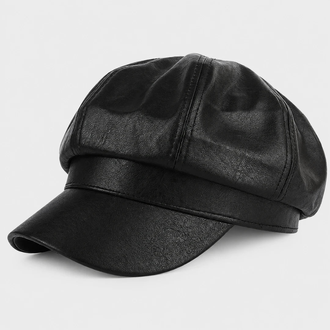 Josh & Tate - LuxeDome™ Faux Leather Beret - A black faux-leather newsboy cap with a structured six-panel crown and a curved brim, shown on a light gray background.