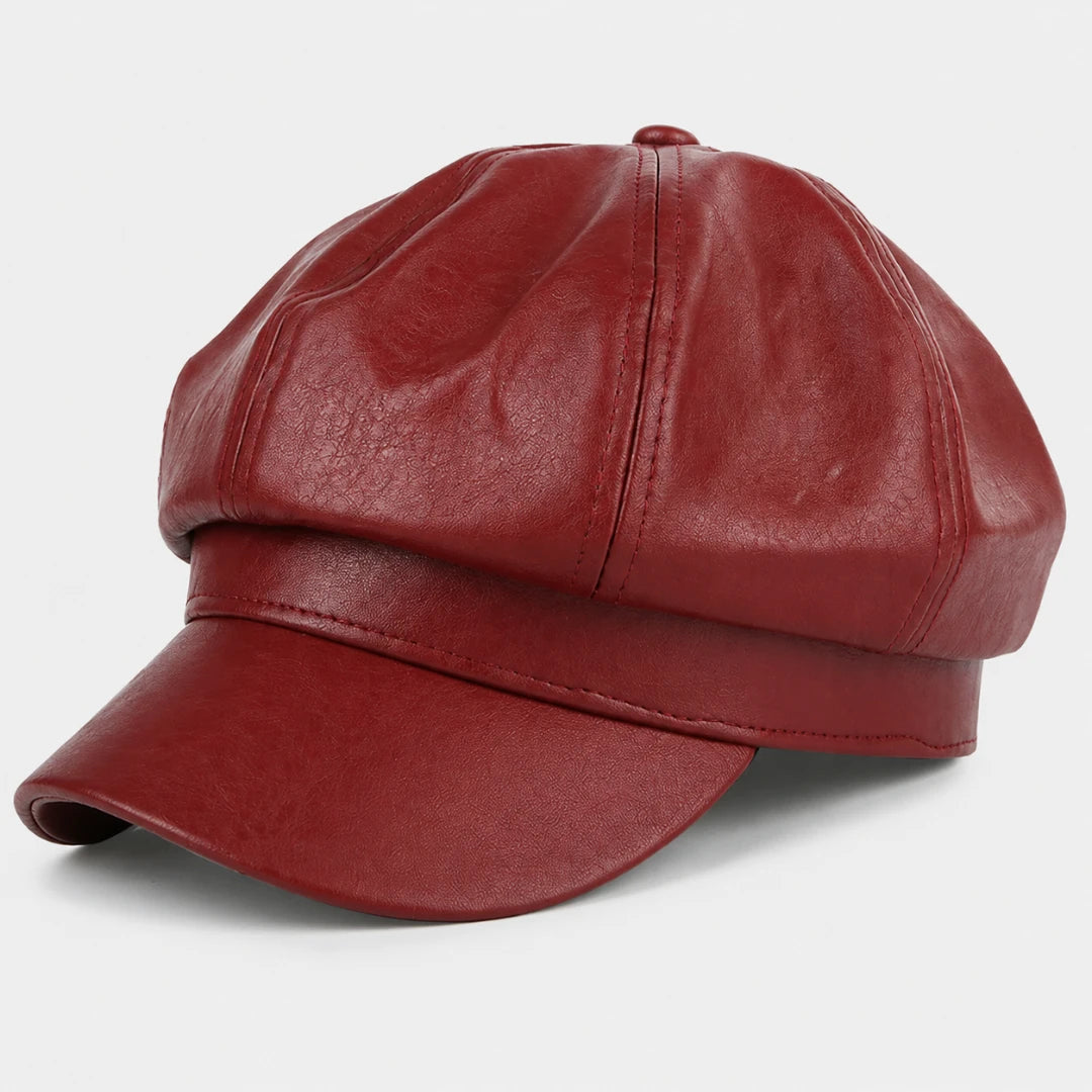 Josh & Tate - LuxeDome™ Faux Leather Beret - A structured red cap with a curved brim, made of smooth leather or faux leather, shown on a light gray background.