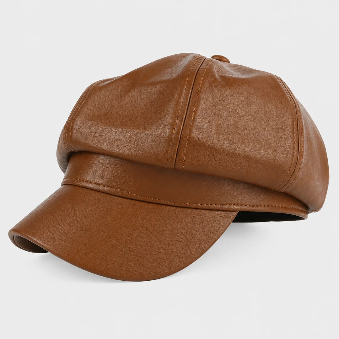 Josh & Tate - LuxeDome™ Faux Leather Beret - A brown faux-leather newsboy cap with a curved brim, shown from a three-quarters angle on a light gray background.