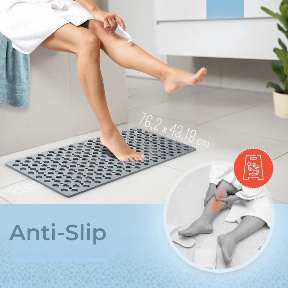 Person stepping onto a gray anti-slip mat with text indicating size and features.