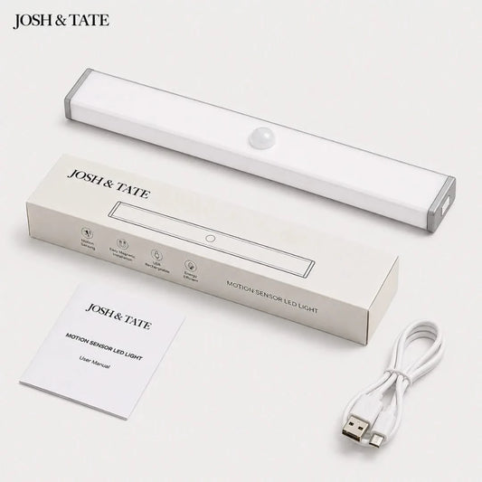 Josh & Tate motion sensor LED light with packaging and USB cable on a white background