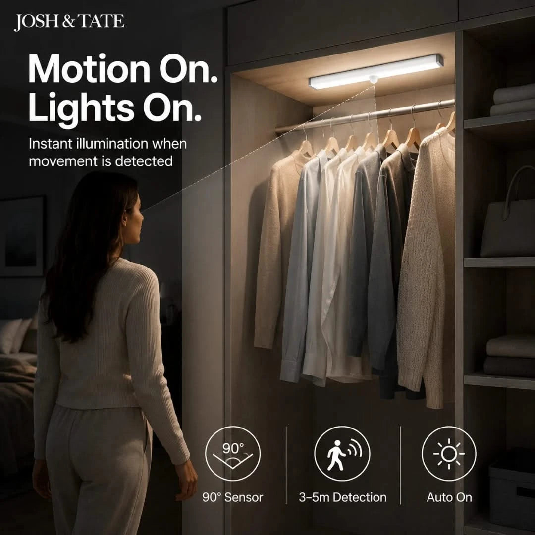 Josh & Tate - MagBar™ Motion-Sensing LED Light - Woman standing in a closet with motion-activated lighting, featuring Josh & Tate product branding.