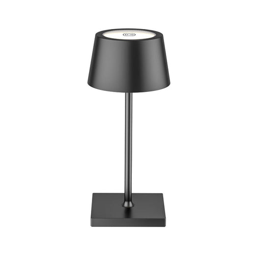 Black table lamp with a square base on a white background