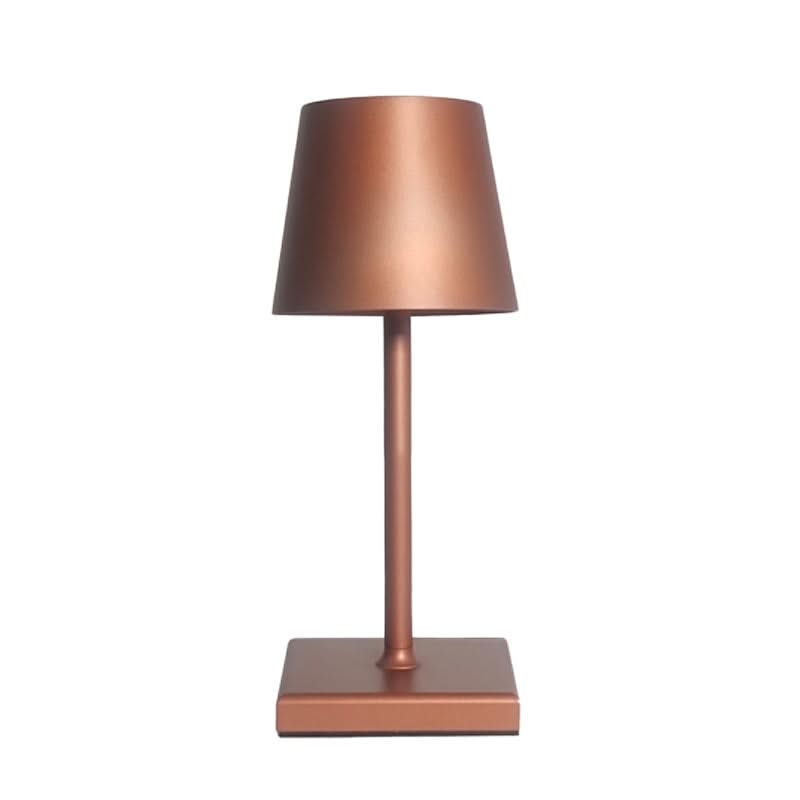 Copper table lamp on a white background