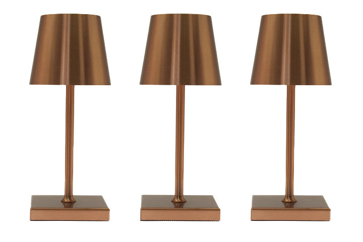 Three bronze-colored table lamps on a white background