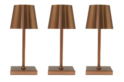 Three bronze-colored table lamps on a white background