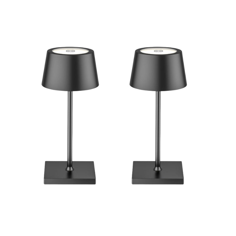 Two black table lamps on a white background