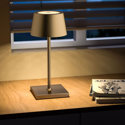 Table lamp on a wooden surface with a blurred background