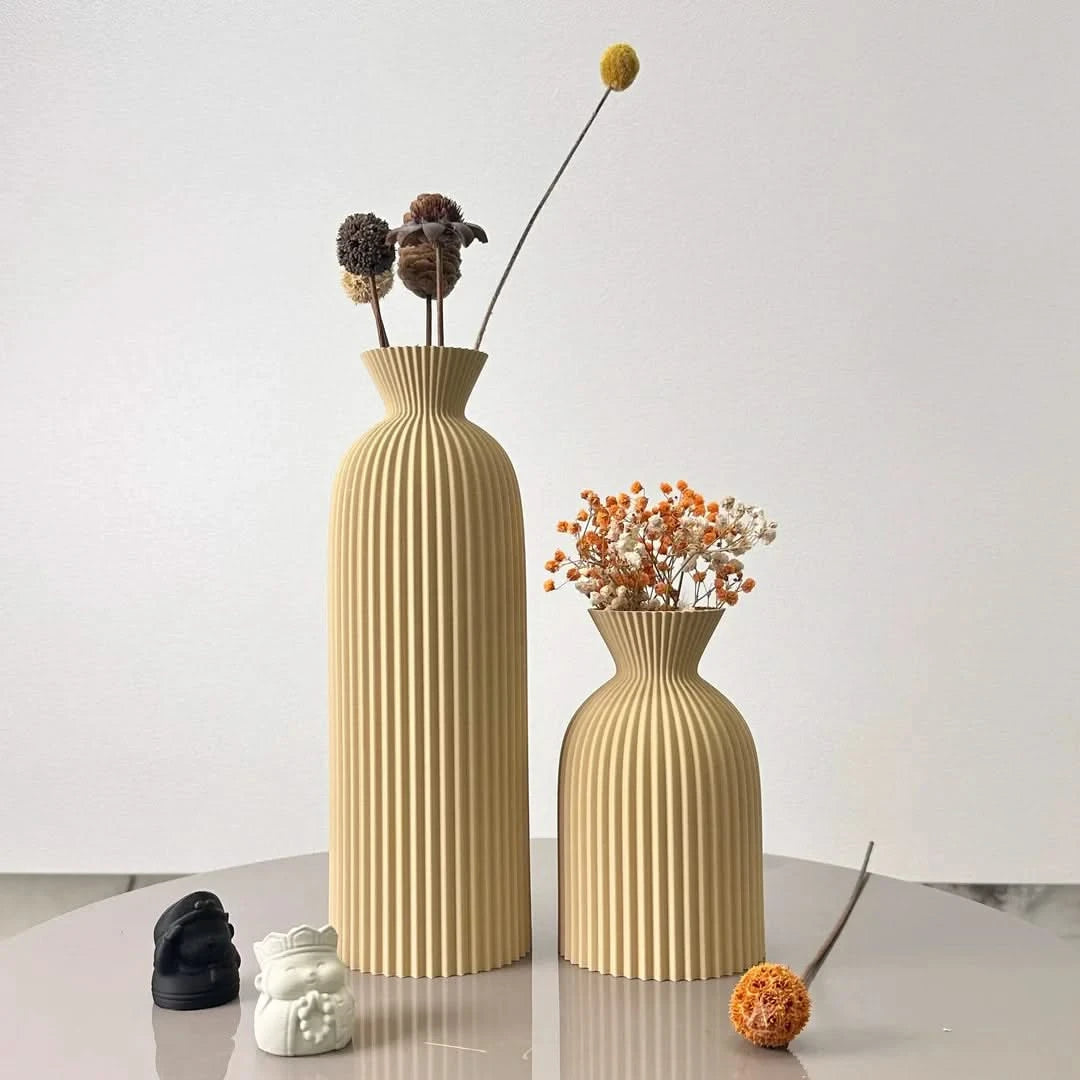 Josh & Tate - Minimalist Fluted Ceramic Vase Set - Two beige textured vases with dried flowers on a light surface and white background