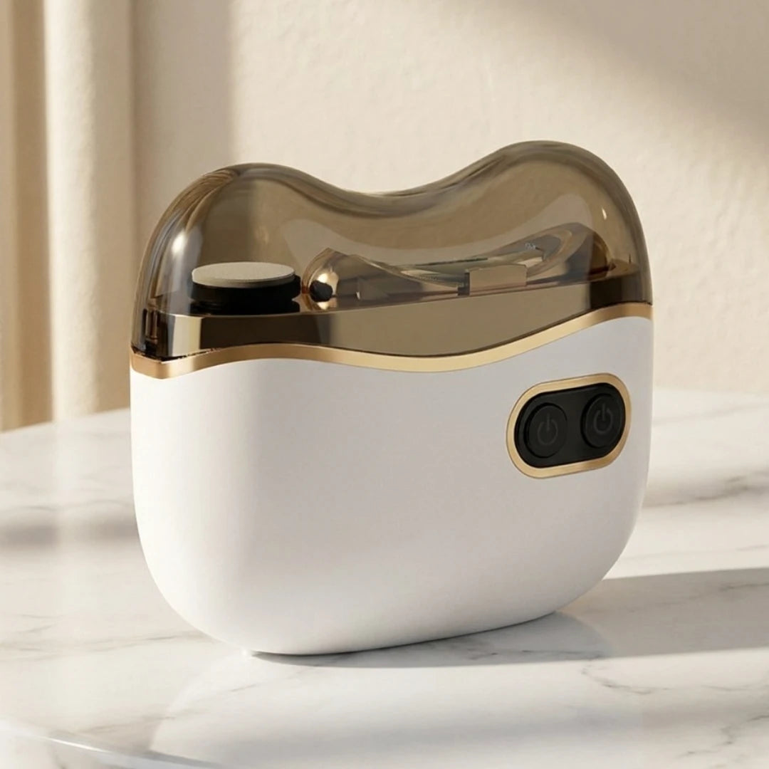 Josh & Tate - NailPod™ Automatic Nail Care System - White and gold electronic device on a marble surface