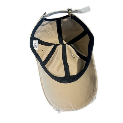 Josh & Tate - NeverGiveUp™ Baseball Cap - Beige cap with black visor on a white background