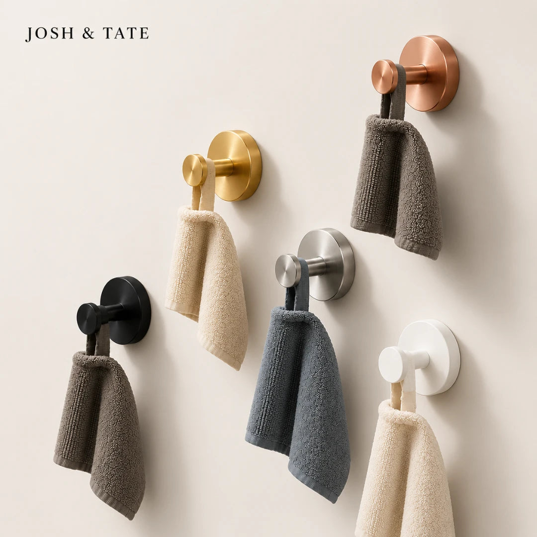Josh & Tate - NordHook™ Scandinavian Wall Hook Set - Wall-mounted hooks with towels in various colors on a light background, featuring the brand 'Josh & Tate'.