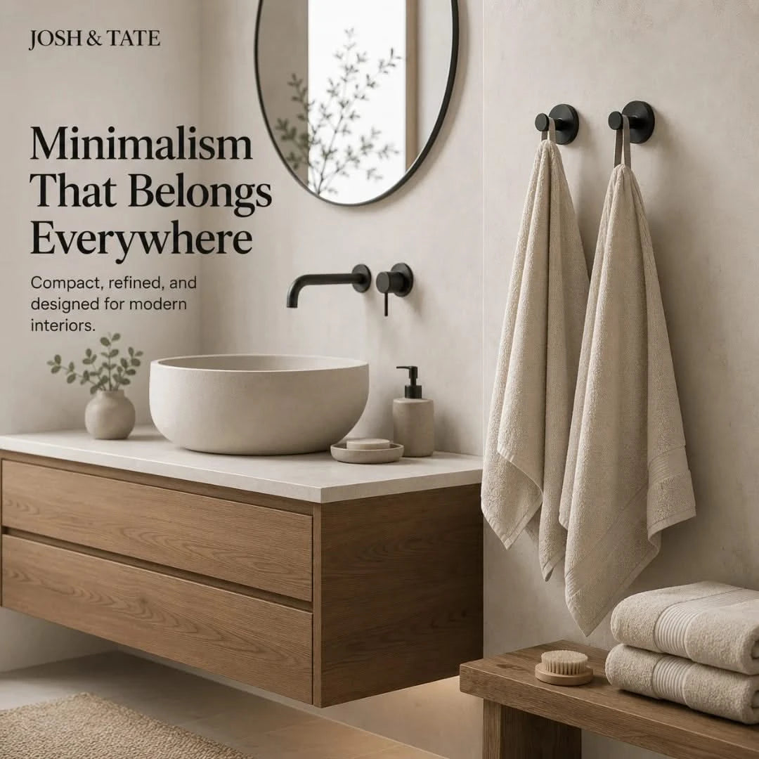 Josh & Tate - NordHook™ Scandinavian Wall Hook Set - Bathroom interior with wooden vanity, round mirror, and towels, featuring Josh & Tate branding.