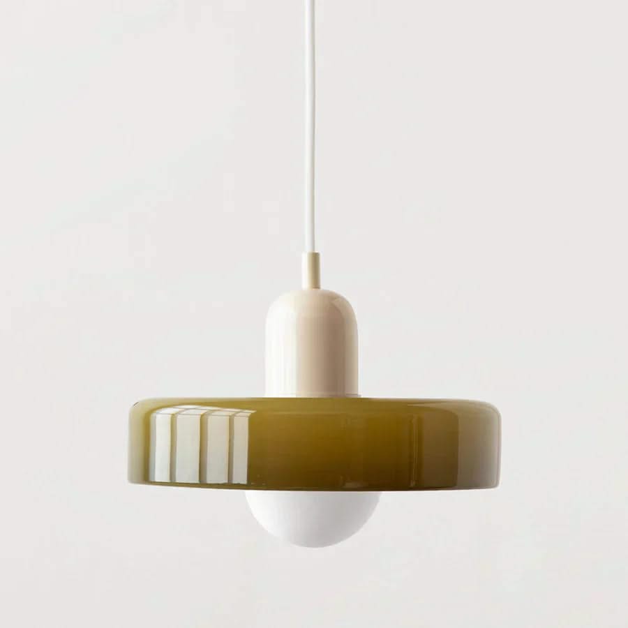 Pendant light with a green and white design on a plain background