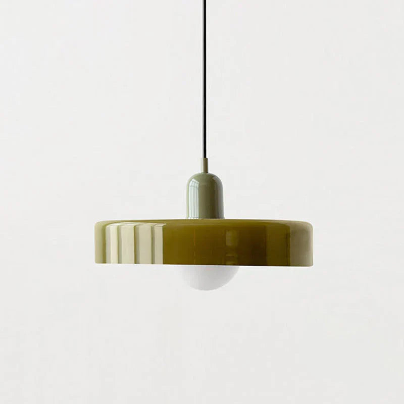 Pendant light with a green and white design on a light gray background
