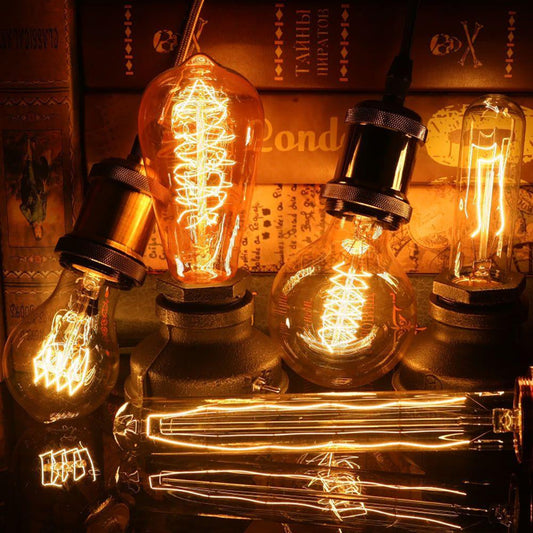 Vintage-style light bulbs with intricate filaments on a textured background