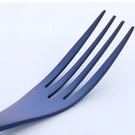 Blue fork on a light gray background