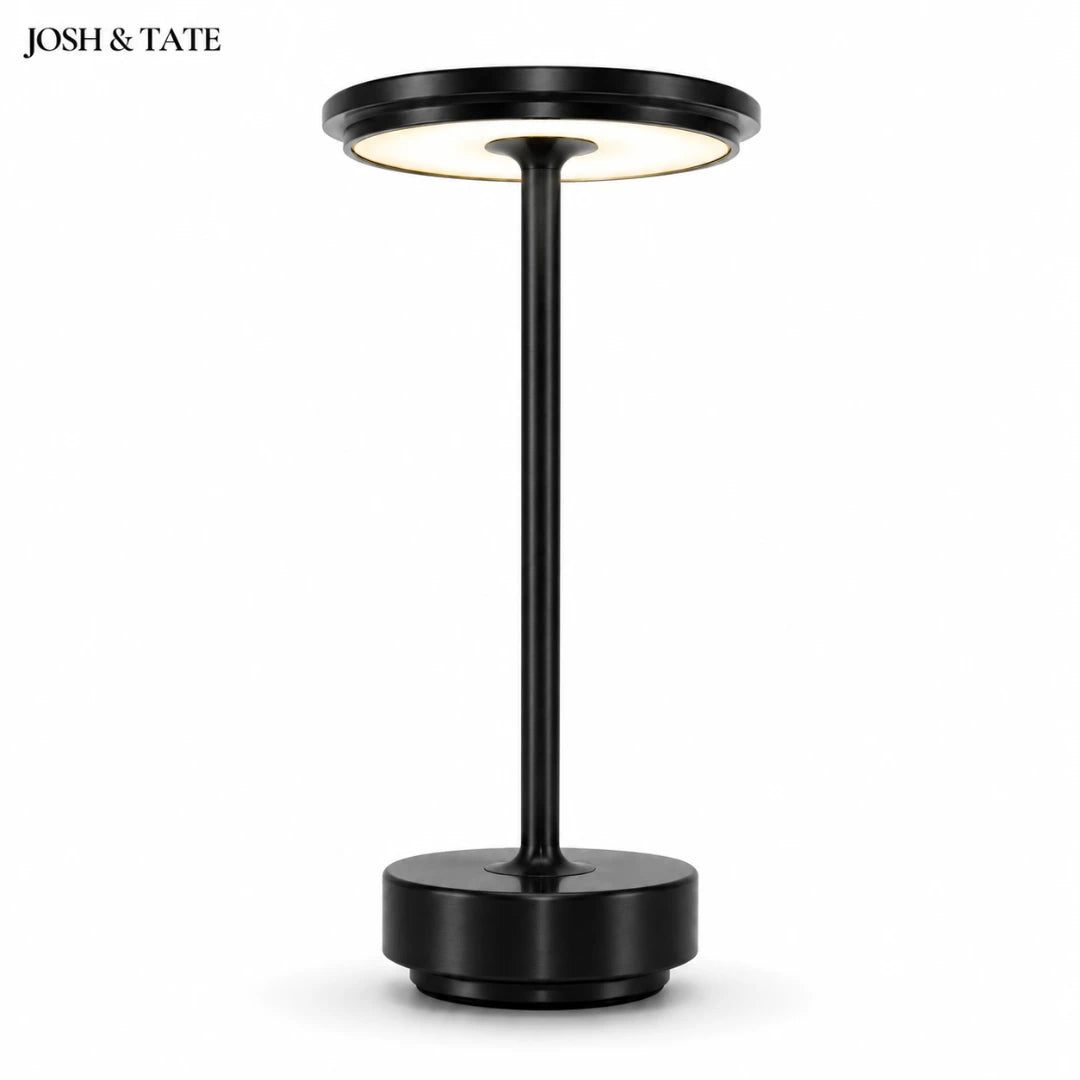 Josh & Tate - OrbitGlow™ Cordless Table Lamp - Black floor lamp with circular top and base on a white background, featuring the brand 'Josh & Tate'.