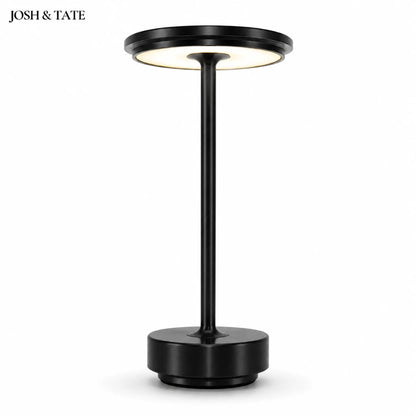 Josh & Tate - OrbitGlow™ Cordless Table Lamp - Black floor lamp with circular top and base on a white background, featuring the brand 'Josh & Tate'.