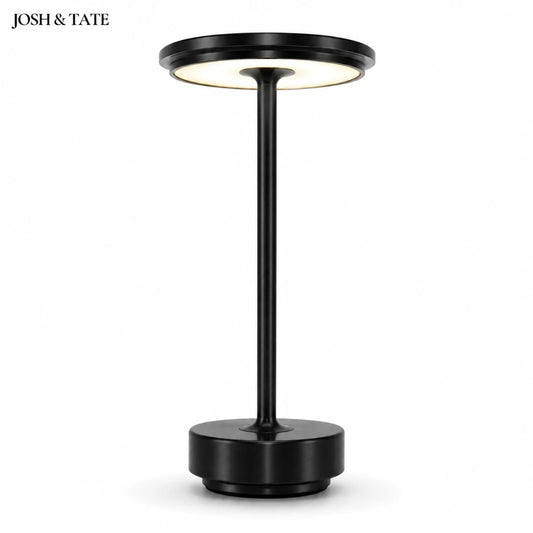Josh & Tate - OrbitGlow™ Cordless Table Lamp - Black floor lamp with circular top and base on a white background, featuring the brand 'Josh & Tate'.