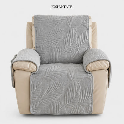 Josh & Tate -PalmSoft™ Quilted Chair Cover - Gray textured chair cover on a beige armchair with 'Josh & Tate' branding.
