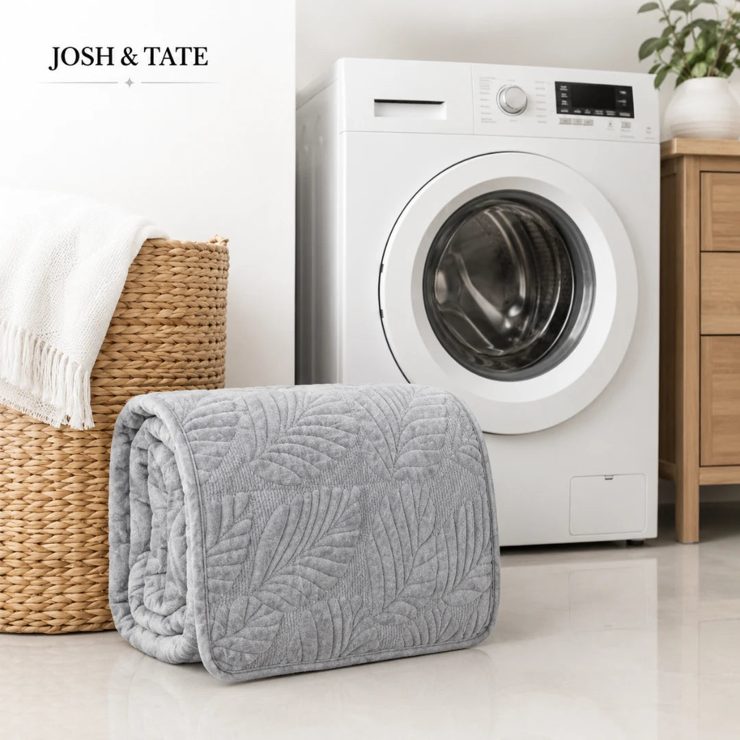 Josh & Tate - PalmSoft™ Quilted Chair Cover - Gray quilted blanket in front of a washing machine with 'Josh & Tate' branding.