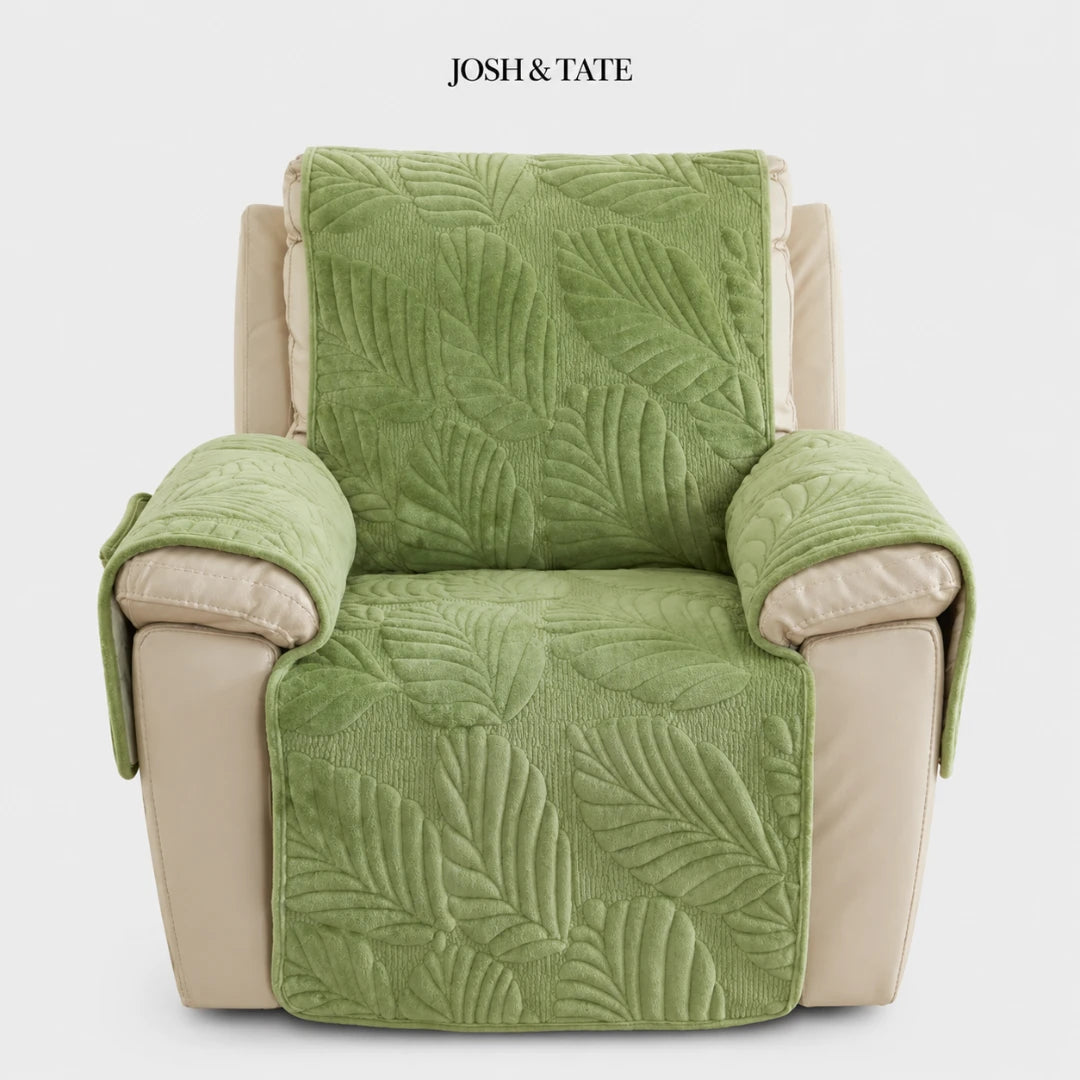 Josh & Tate - PalmSoft™ Quilted Chair Cover - Green leaf-patterned chair cover on a beige armchair with 'Josh & Tate' branding.