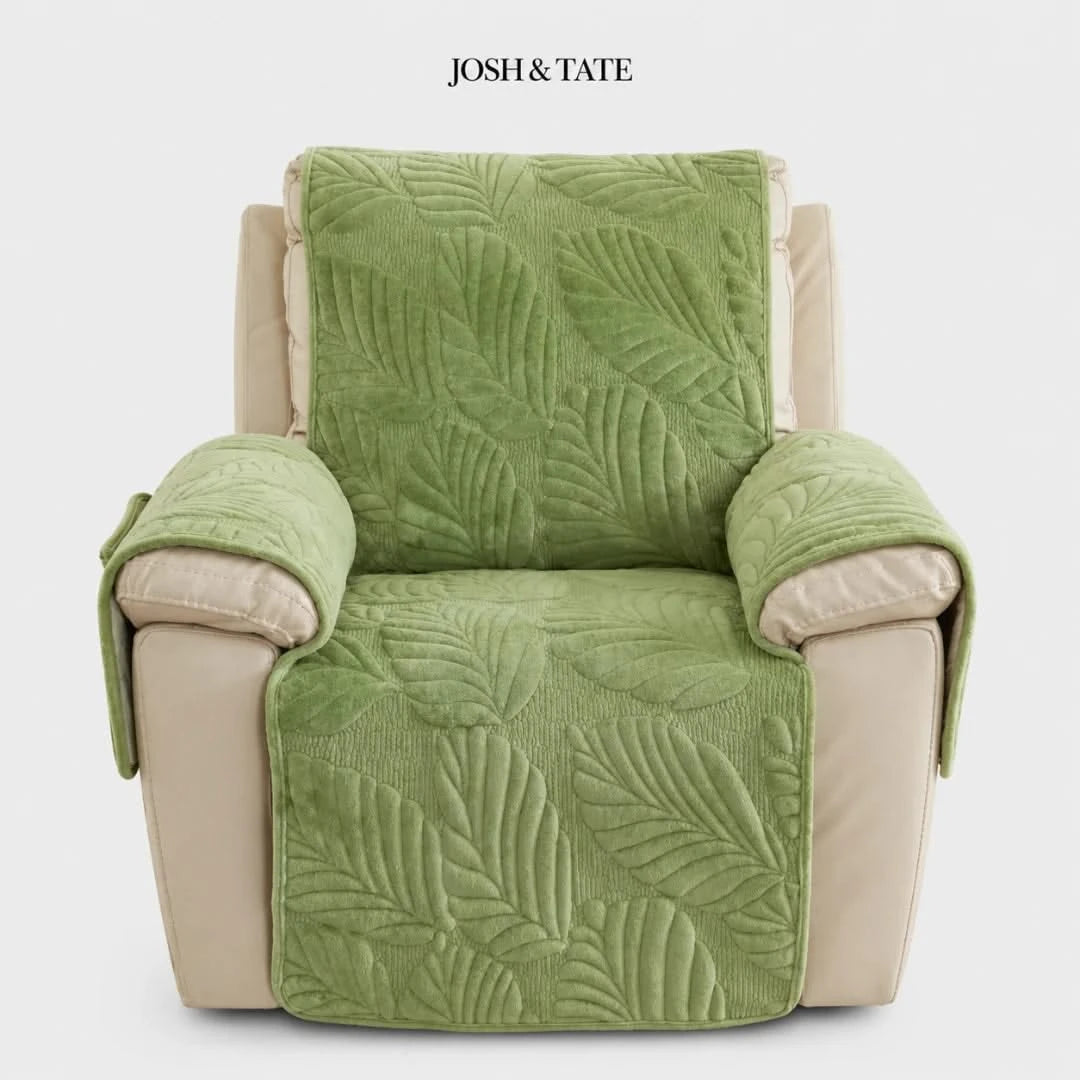 Josh & Tate - PalmSoft™ Quilted Chair Cover - Green leaf-patterned chair cover on a beige armchair with 'Josh & Tate' branding.