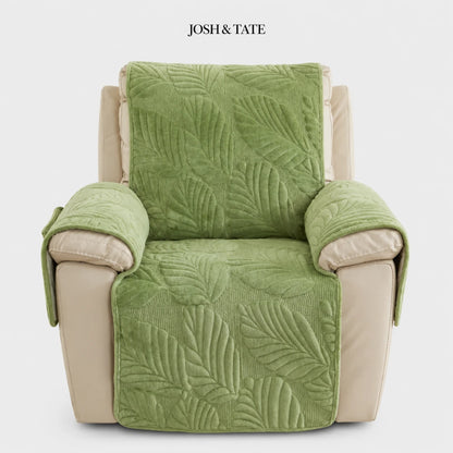 Josh & Tate - PalmSoft™ Quilted Chair Cover - Green leaf-patterned chair cover on a beige armchair with 'Josh & Tate' branding.